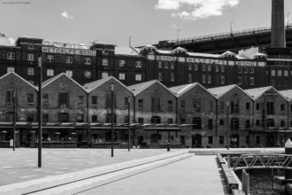Views of former warehouses at Campbells Cove in The Rocks and behind them is the iconic Metcalfe Bond Building during the Sydney lockdown.