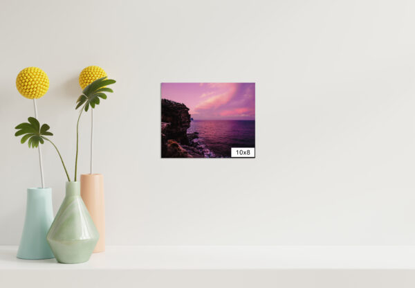 Dramatic pink sunset over Gap Bluff, Watsons Bay in Sydney, with vibrant colors lighting up the ocean horizon.