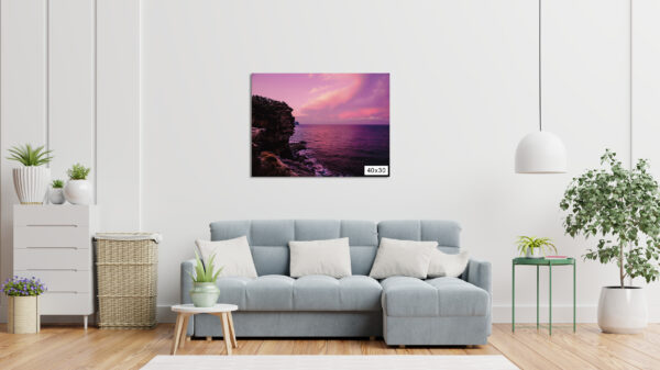 Dramatic pink sunset over Gap Bluff, Watsons Bay in Sydney, with vibrant colors lighting up the ocean horizon.