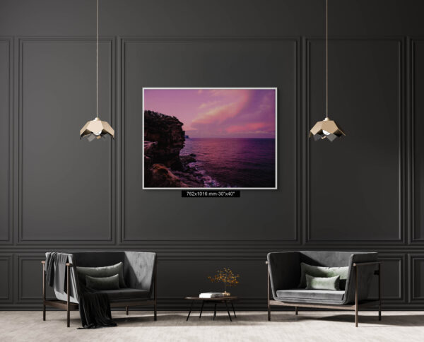 Dramatic pink sunset over Gap Bluff, Watsons Bay in Sydney, with vibrant colors lighting up the ocean horizon.