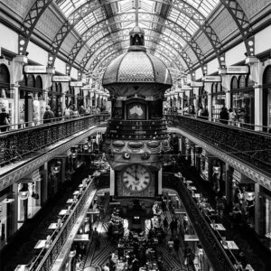 Interior of Queen Victoria Building showing the Great Australian Clock in black and white.