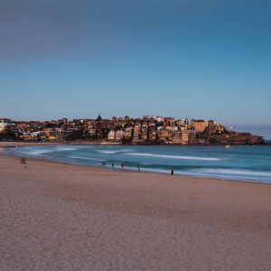Bondi Beach empty, showing showing the apartments at Ben Buckler.