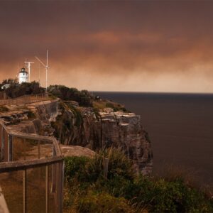 The Sydney Cliff Walk at Christison Park surrounded by orange bushfire smoke, Vaucluse, Sydney.