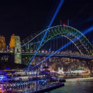 Vivid Sydney, with views of The Harbour Bridge and The Overseas Passenger Terminal.
