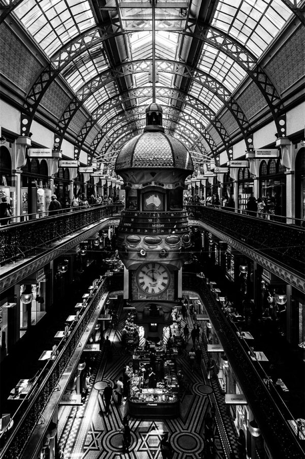 Interior of Queen Victoria Building showing the Great Australian Clock in black and white.