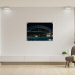 Vivid Sydney, a close up of the Harbour Bridge showing the north Sydney Skyline and Luna Park. Wall Art Prints for home and office decor.