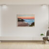 Coastal wall art print of Tamarama Beach with a vibrant orange glow capturing the serene beauty of the Sydney shoreline.