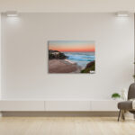 Coastal wall art print of Tamarama Beach with a vibrant orange glow capturing the serene beauty of the Sydney shoreline.