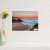 Coastal wall art print of Tamarama Beach with a vibrant orange glow capturing the serene beauty of the Sydney shoreline.