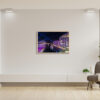 Premium Wooden Oak Framed print of Bennelong Apartments with a vivid purple glow, part of the Vivid Sydney collection, ideal for elegant home and office decor.