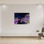 Matte print of Bennelong Apartments with a vivid purple glow, part of the Vivid Sydney collection, ideal for elegant home and office decor.