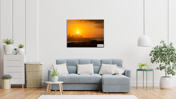Sunset over the Sydney skyline from Dudley Page Reserve, with a romantic couple silhouetted in the foreground against the cityscape.