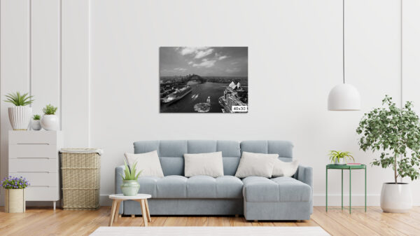 Black and white photograph of the iconic Sydney Harbour skyline, featuring the Sydney Opera House and Harbour Bridge against a timeless backdrop. Perfect as wall decor, this art print captures the city's architectural beauty and urban landscape in a classic monochrome style.