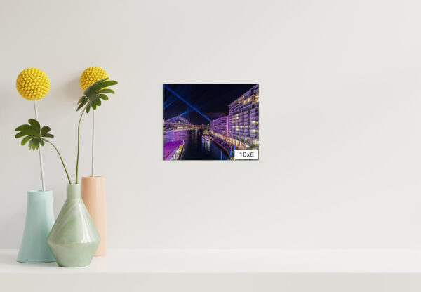 Vivid Sydney wall art print featuring Bennelong Apartments and Harbour Bridge with a purple glow at night.