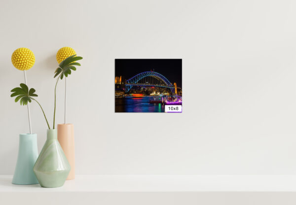 Vivid Sydney Lights featuring the illuminated Sydney Harbour Bridge, perfect for home and office wall decor. Bright and vibrant colors capturing the energy of Sydney’s iconic landmarks during the famous light festival.