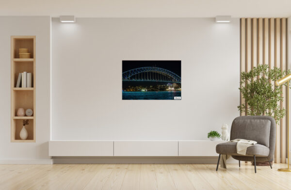 Wall art print of Sydney Harbour Bridge illuminated with vivid lights at night