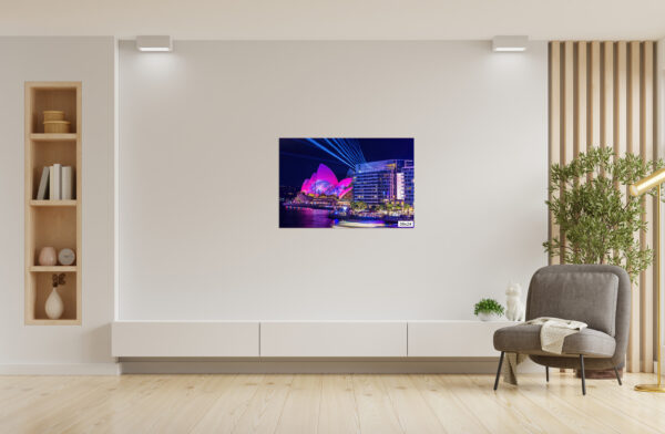 Vivid Sydney fine art print featuring the Sydney Opera House illuminated with pink lights and laser projections, viewed from Bennelong Apartments.