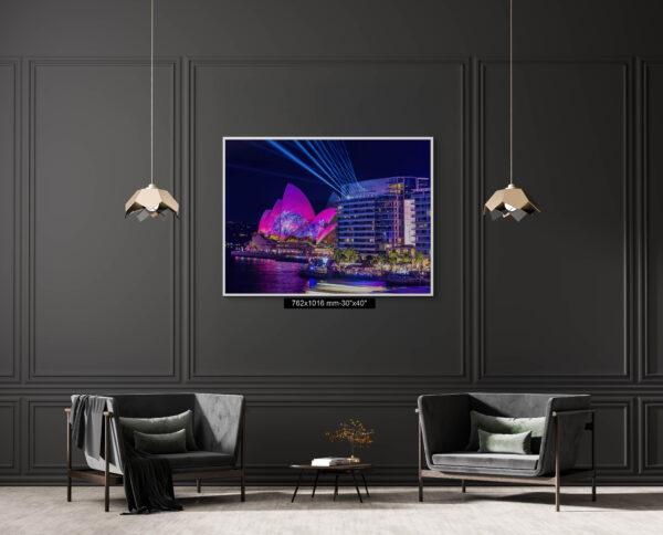 Vivid Sydney fine art print featuring the Sydney Opera House illuminated with pink lights and laser projections, viewed from Bennelong Apartments.