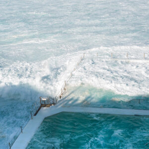Bondi Icebergs ocean pool with waves crashing over edge, Sydney coastal photography print