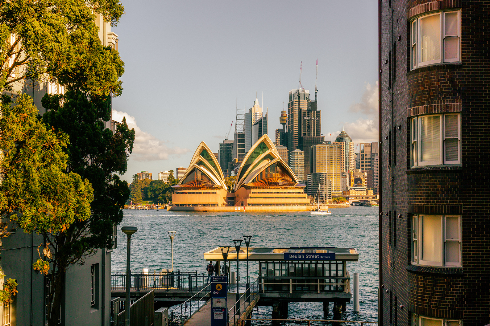 Sydney Opera House viewed from Kirribilli between two Art Deco apartment buildings