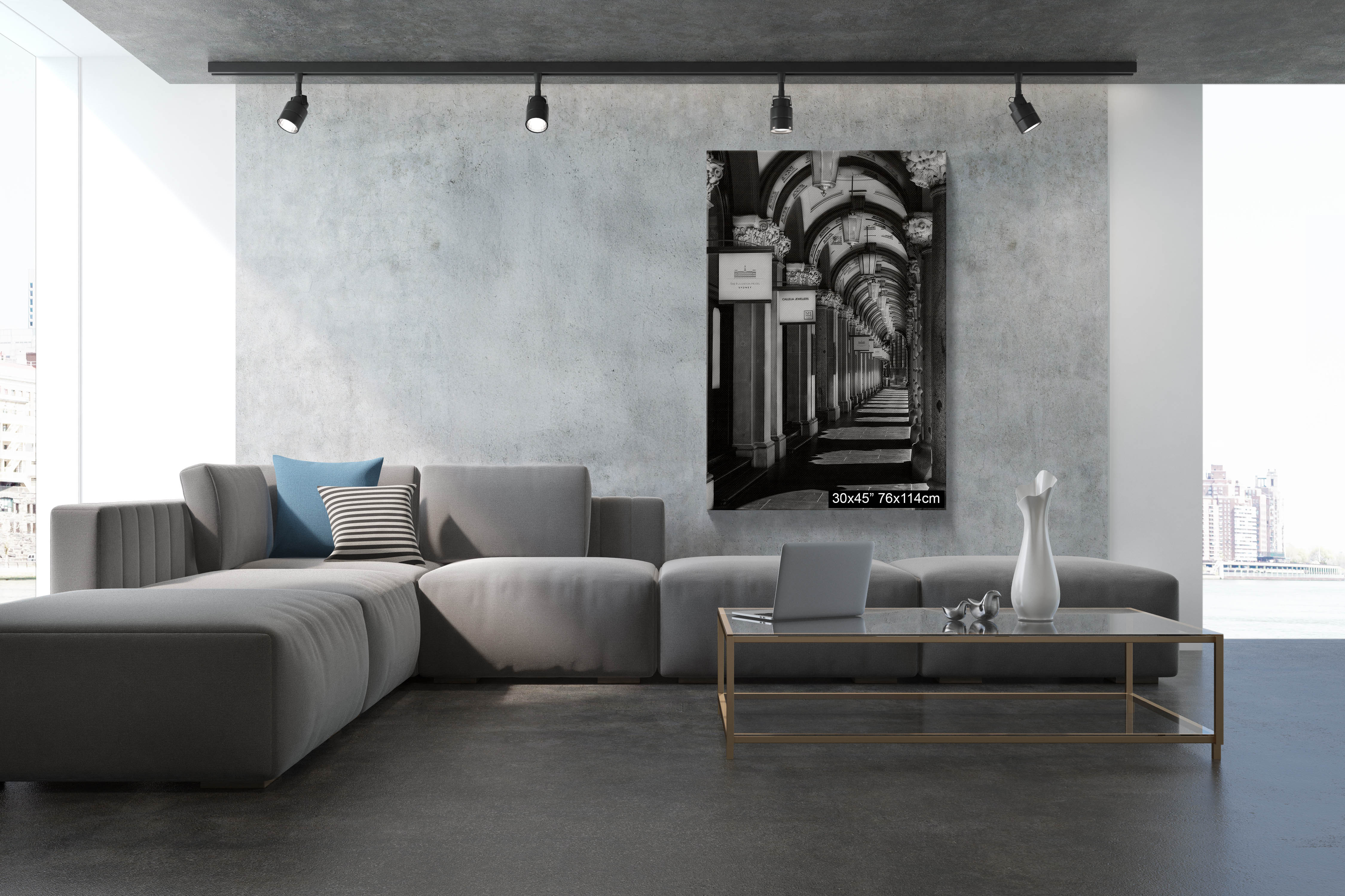 The Colonnades Sydney black and white architectural photograph displayed as a large 30 × 45 inch vertical stretched canvas wall art print above a grey sectional sofa in a contemporary living room.